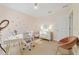 Bright bedroom featuring a vanity and desk setup at 14502 Bahama Swallow Blvd, Winter Garden, FL 34787