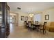 Formal dining room with a large table and access to the entryway at 14502 Bahama Swallow Blvd, Winter Garden, FL 34787