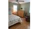 Comfortable bedroom showcasing a ceiling fan and plant in the corner at 1500 Gay Rd # 10C, Winter Park, FL 32789