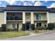 Inviting condo building exterior with landscaping at 1500 Gay Rd # 10C, Winter Park, FL 32789