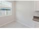 Bright kitchen nook featuring tile flooring and a window with natural light at 16462 Glassy Loch Loop, Clermont, FL 34714