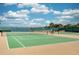 Enjoy a game on these well-maintained tennis courts under a beautiful blue sky at 16560 Point Rock Dr, Winter Garden, FL 34787