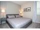 King-size bed in a well-lit bedroom at 1830 Sawyer Palm Pl, Kissimmee, FL 34747