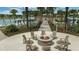 Community fire pit with seating for residents at 1830 Sawyer Palm Pl, Kissimmee, FL 34747