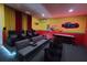 Cars-themed game room with theater seating and air hockey at 1830 Sawyer Palm Pl, Kissimmee, FL 34747