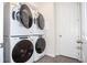 Modern laundry room with washer and dryer at 1830 Sawyer Palm Pl, Kissimmee, FL 34747