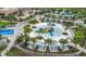 Resort-style pool with water features and cabanas at 1830 Sawyer Palm Pl, Kissimmee, FL 34747