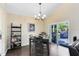 Bright dining room with hardwood floors and patio access at 1834 Duffy Ct, Lake Mary, FL 32746