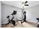 Home gym with Peloton bike and other exercise equipment at 1834 Duffy Ct, Lake Mary, FL 32746