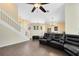 Bright living room featuring hardwood floors and a comfortable sectional sofa at 1834 Duffy Ct, Lake Mary, FL 32746