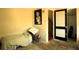 This bedroom features carpeted floors and natural lighting at 214 E 18Th St, Sanford, FL 32771