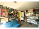 Room with walls covered in artwork and a couch at 214 E 18Th St, Sanford, FL 32771