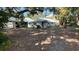 House with a spacious backyard and mature trees at 214 N New Hampshire Ave, Tavares, FL 32778