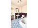 Bathroom with mosaic tile, a pedestal sink, a toilet, and a bathtub at 214 N New Hampshire Ave, Tavares, FL 32778