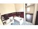 Bathroom featuring mosaic floors, bathtub, vintage tile walls, and fixtures at 214 N New Hampshire Ave, Tavares, FL 32778
