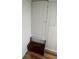 Small bedroom closet with built-in shelving at 214 N New Hampshire Ave, Tavares, FL 32778