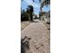 Brick path lined with trees and grass at 214 N New Hampshire Ave, Tavares, FL 32778