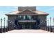 Exterior shot of large community center with stairs leading to covered entrance and lakeside view at 214 N New Hampshire Ave, Tavares, FL 32778