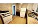 Kitchen with white appliances and linoleum flooring at 214 N New Hampshire Ave, Tavares, FL 32778