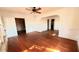 Hardwood floors and archways in the living room at 214 N New Hampshire Ave, Tavares, FL 32778