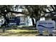 A waterfront building at Wooton Park in Tavares, Florida sits near a lake at 214 N New Hampshire Ave, Tavares, FL 32778
