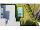 A bird's-eye view captures the minimalist design of the house and its modern pool, emphasizing clean lines at 2412 Chantilly Ave, Winter Park, FL 32789