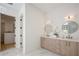Well-lit bathroom featuring double sinks, stylish fixtures, and an open floor plan at 2412 Chantilly Ave, Winter Park, FL 32789