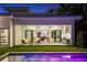 Open-concept design showcases the indoor/outdoor living with backyard pool and grill area at 2412 Chantilly Ave, Winter Park, FL 32789