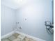 Functional laundry room with tile floors, neutral wall colors, and utility hookups at 262 Orienta Point St # 1, Altamonte Springs, FL 32701