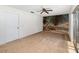 Empty bedroom with beach mural and sliding door access at 306 Loch Low Dr, Sanford, FL 32773