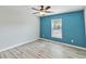 Well-lit bedroom featuring a ceiling fan and large window at 330 Pheasant Dr, Haines City, FL 33844