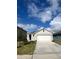 Charming single-story home with a well-maintained lawn, and a two-car garage at 3534 Fort Mellon Ln, Sanford, FL 32773