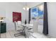 Bright dining area with a marble-top table and large window offering natural light at 421 Boxwood Dr, Davenport, FL 33837