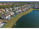 Aerial view of houses and lakefront properties at 4700 Golden Beach Ct, Kissimmee, FL 34746