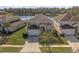 Two-story house with a lake view in a residential neighborhood at 4700 Golden Beach Ct, Kissimmee, FL 34746