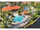 Resort-style pool and clubhouse with lake views at 4700 Golden Beach Ct, Kissimmee, FL 34746