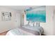 Serene bedroom with a large wave art piece creating a calming atmosphere at 4817 Gallant Ln, Orlando, FL 32821