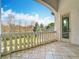 Spacious balcony overlooking lush landscaping and golf course at 5067 Latrobe Dr, Windermere, FL 34786