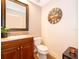 Small bathroom with toilet and granite vanity at 5409 Napoli Cv, Lake Mary, FL 32746