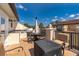 Private rooftop patio with built-in grill and seating at 5409 Napoli Cv, Lake Mary, FL 32746