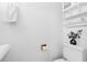 Bathroom featuring a decorative vase on the toilet tank and storage shelves at 564 Shadow Glenn Pl, Winter Springs, FL 32708