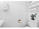 Bathroom with toilet, wall storage and hand towel at 564 Shadow Glenn Pl, Winter Springs, FL 32708