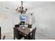 Dining room showcasing table and easy transition to the connected living room at 564 Shadow Glenn Pl, Winter Springs, FL 32708