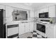 Well-lit kitchen features a stainless steel double sink and plenty of counter space at 564 Shadow Glenn Pl, Winter Springs, FL 32708