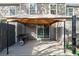 Covered patio featuring a grill and access to the home through a sliding glass door, perfect for gatherings at 564 Shadow Glenn Pl, Winter Springs, FL 32708