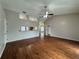 Living room with high ceilings and wood flooring at 594 Terranova Cir, Winter Haven, FL 33884