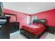 Spacious bedroom featuring a wooden dresser and nightstands with white tile floors and a red and gold comforter at 741 Gila Dr, Kissimmee, FL 34759