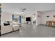 Living room with tile floors and large windows at 812 Gisele Ct, Haines City, FL 33844