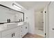 Bright bathroom featuring double sinks, modern fixtures, and a walk-in shower at 8546 Amber Oak Dr, Orlando, FL 32817