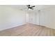 Simple bedroom with vinyl flooring and a large closet at 8546 Amber Oak Dr, Orlando, FL 32817